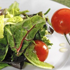 Image from the LA Times showing a green salad with tomatos